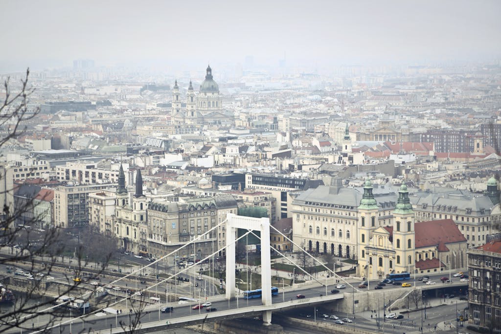 Panoramic view of Budapest cityscape from Gellért Hill, showing Elisabeth Bridge and historic buildings