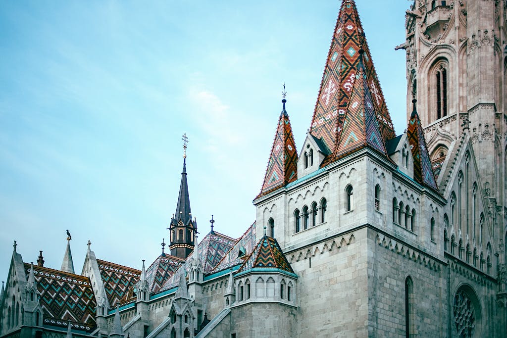 Close-up of Matthias Church roof in Budapest with colorful Zsolnay ceramic tiles and gothic spires