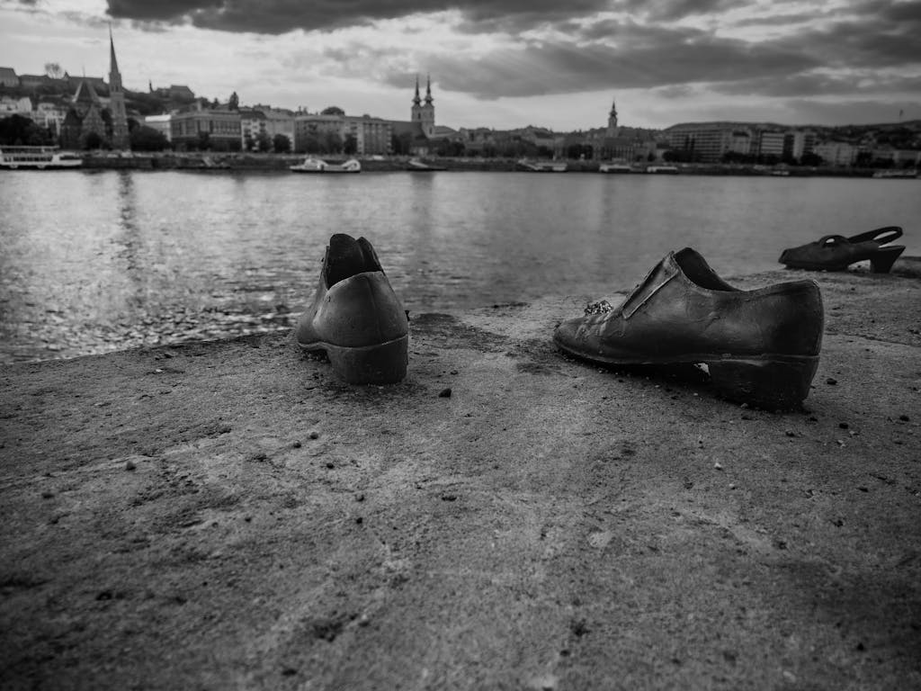 Powerful Holocaust memorial showing shoes on the Danube riverbank in Budapest, Hungary.