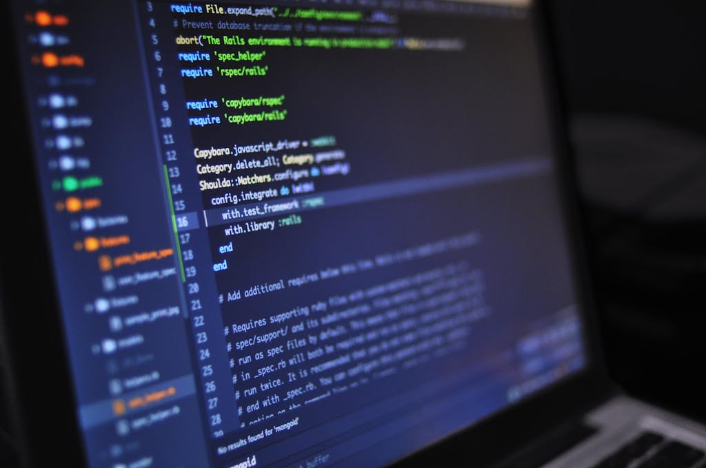 Close-up of laptop screen with highlighted code in a text editor, symbolizing coding experiments with ChatGPT coding for beginners