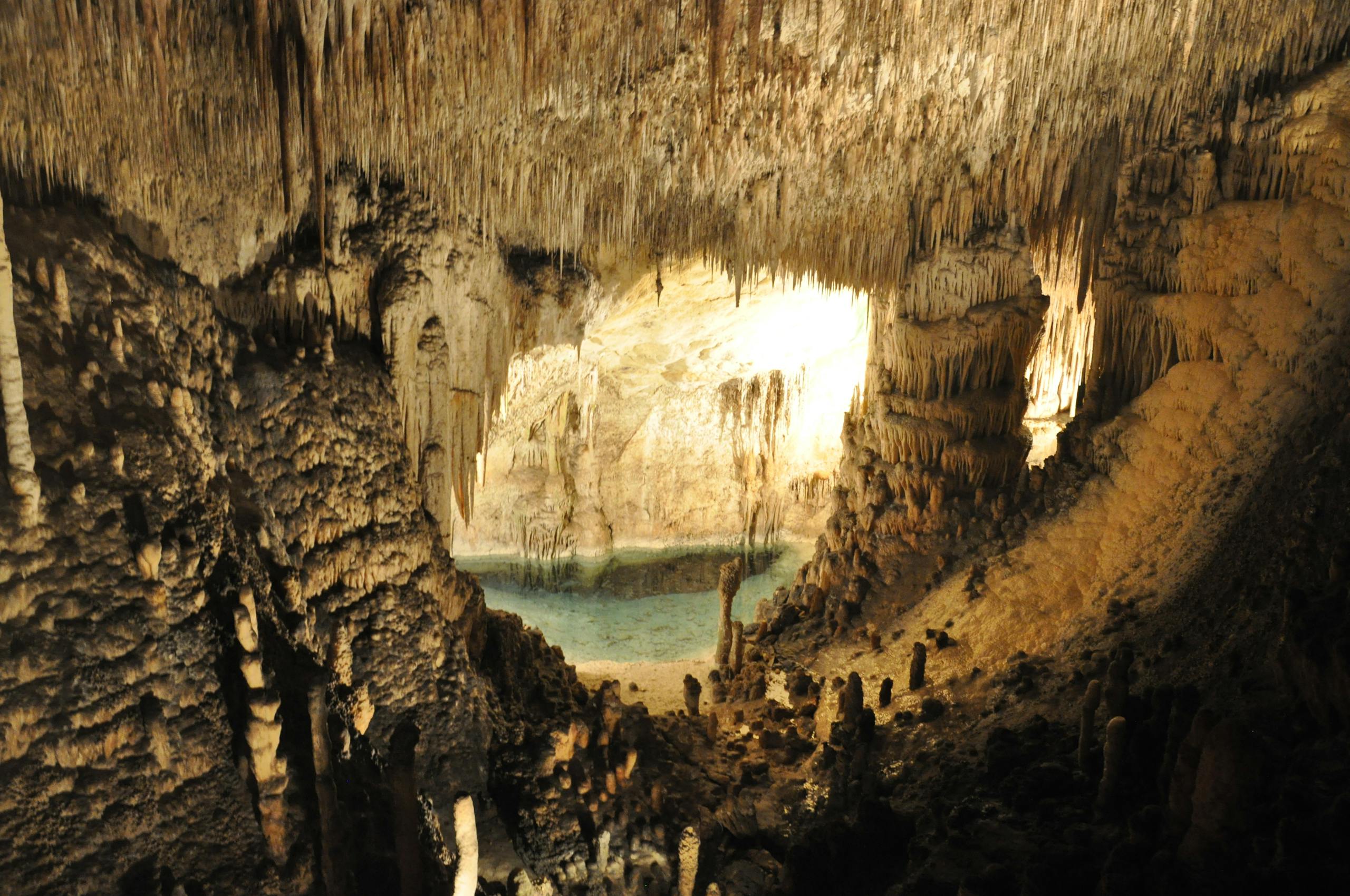 Underground lake and stalactites inside Cuevas del Drach, Mallorca.