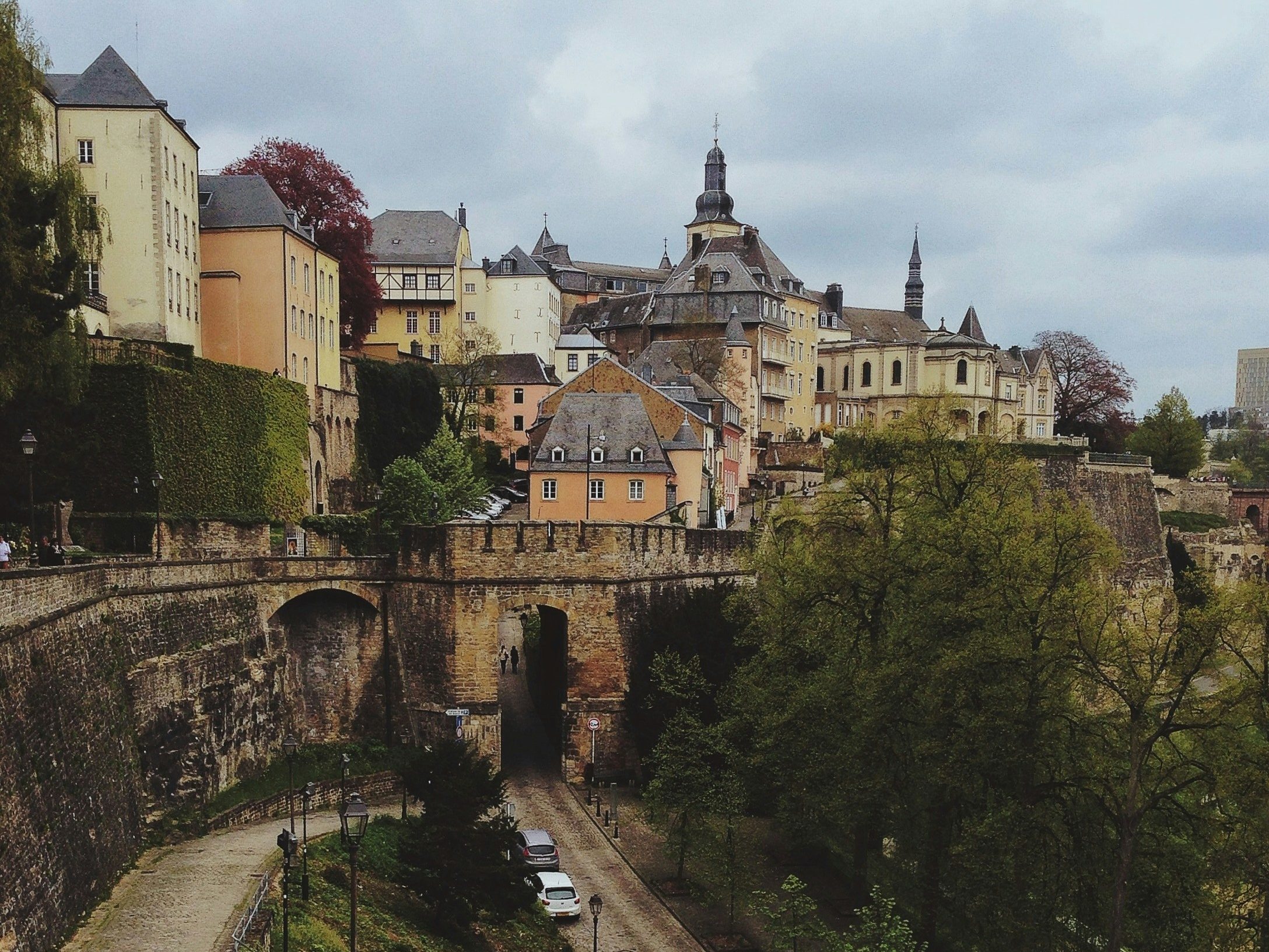 View of Luxembourg City’s old fortress walls and upper town buildings from the Corniche area